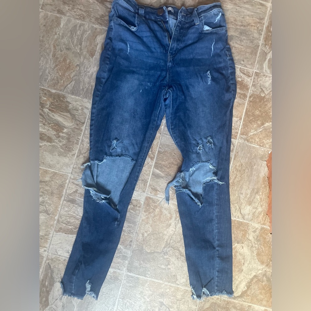 Tight ripped jeans worn a couple of times in great consolation